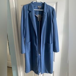 Long sleeve spring jacket with pockets. Never been worn. Size M.